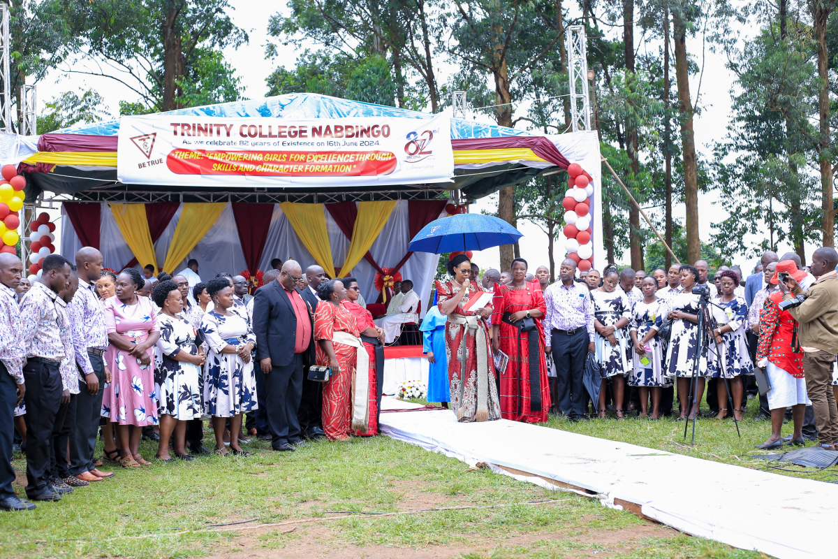 The Headteacher with staff members of Trinity College Nabbingo